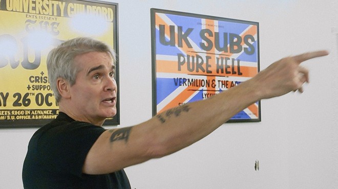 Henry Rollins pointing.