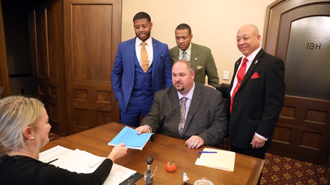 Reps. Isaac Robinson (front), Jewell Jones (left), Tyrone Carter (center), and Sheldon Neeley.