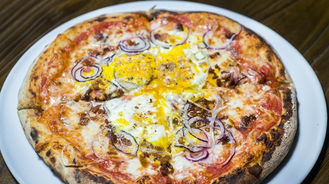 Fox Hollow Farm pizza with egg, pancetta, and red onion.