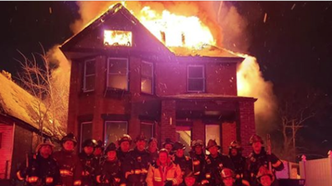 Detroit firefighters may face discipline after posing in front of burning house