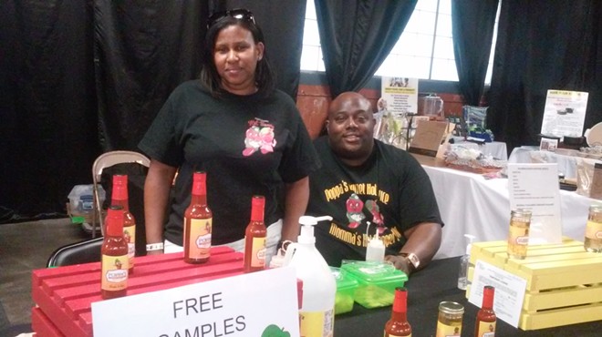Roosevelt and D'Ette Walton of Ypsilanti, selling their Poppa's Gourmet Hot Sauce.