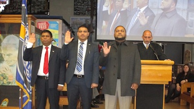 Left to right: Abu Musa, Saad Almasmari, and Anam Miah are sworn in by Judge Paul J. Paruk.