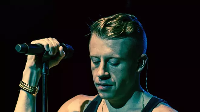 Macklemore performing in Toronto during The Heist Tour on 28 November, 2012. Photo from Wikipedia, used under creative commons; image taken by Drew of The Come Up Show.