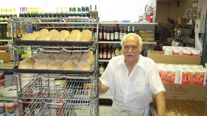 Vince Cucci, baking the bread on a morning in 2014.