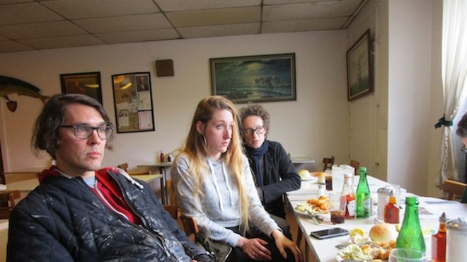 Ryan (far left) and Fabia (center) Mendoza settle in for fish and chips at Scotty Simpson's.