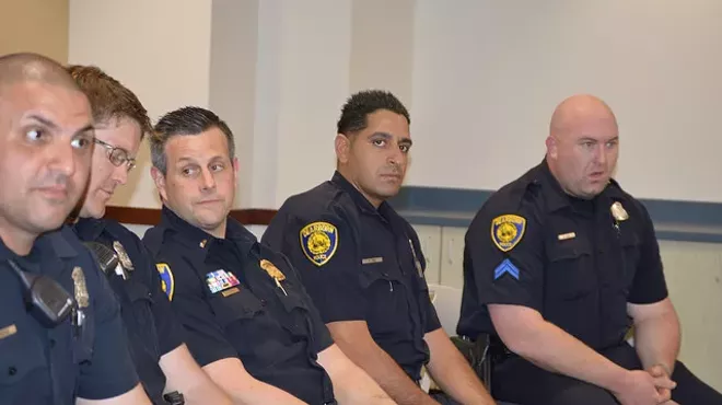 Dearborn city police officers engage in National Day of Prayer Held at the Dearborn Administrative Center May 7, 2015.
