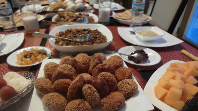 In the foreground, Bangladeshi-style kebabs.