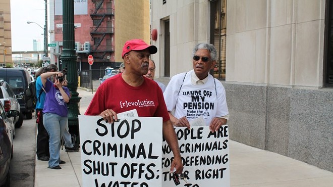 A coalition of groups rally outside of the Detroit Water & Sewerage Department's main office in June 2014 protesting efforts to shut off water service to residential customers with $150 or more in outstanding debt.