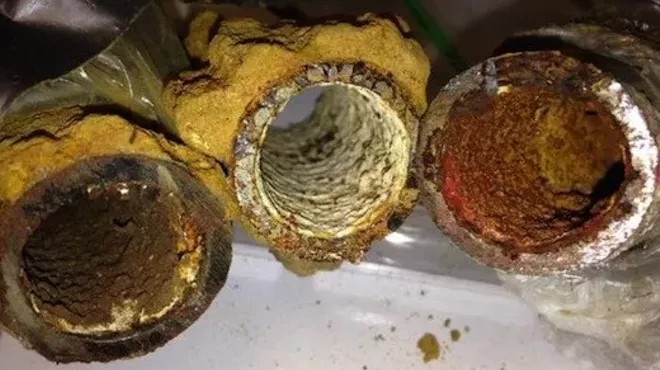 Photo of Flint drinking water pipes showing different kinds of iron corrosion and rust.