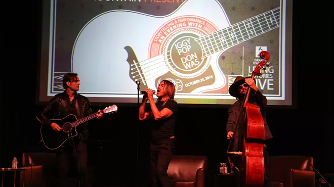 Dean Fertita, left, Iggy Pop, and Don Was play at The Majestic on Sunday.