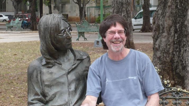 Peter Werbe poses in Havana at John Lennon Park.