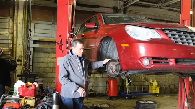 Tony Greiner in his Metro 25 auto shop on Detroit’s east side.