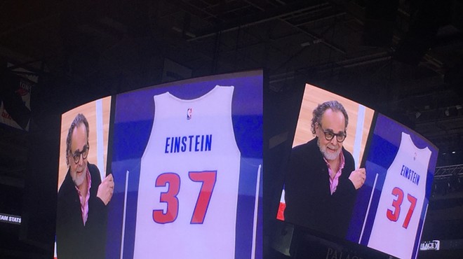 Pistons photographer Allen Einstein is honored at the Palace of Auburn Hills on April 5 with a jersey commemorating his 37 years with the team.