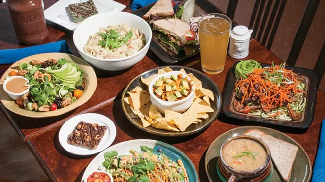 (Counterclockwise from bottom left) Tostada, magic bar, Michigan Salad, Arugala Alfredo, ABLT, s mug of Neu Kombucha, Thai pasta salad, lima bean corn chowder, Southwest Appetizer w/sloppy joe (center).