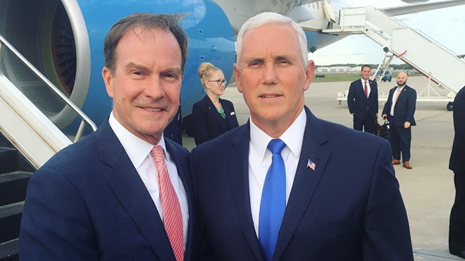Michigan Attorney General Bill Schuette poses with Vice President Mike Pence.