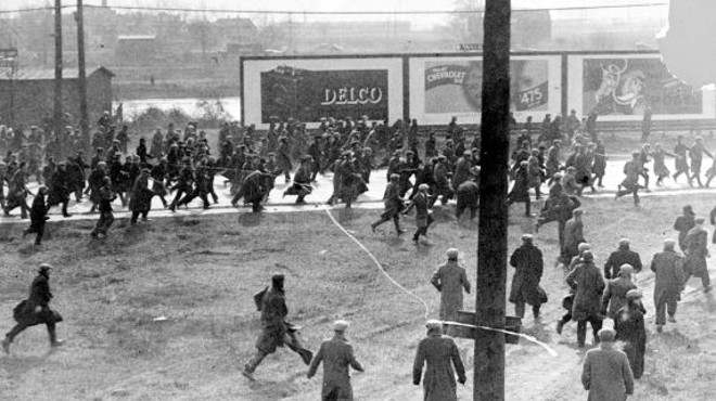 Demonstrators on Miller Road outside of the Rouge Plant flee as tear gas and bullets are released on them by Dearborn Police and Ford Servicemen during the 1932 Ford Hunger March.