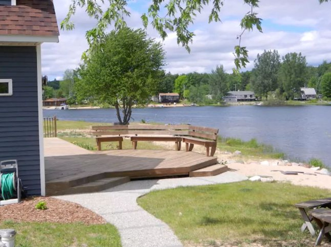 Cadillac, Michigan 
Average nightly rate: $127
With the ability to accommodate a large crowd or a couple, this cottage is the perfect family-friendly environment. The quiet location sits directly behind the lake on a relaxing deck that allows you experience the calm surroundings with ease. 