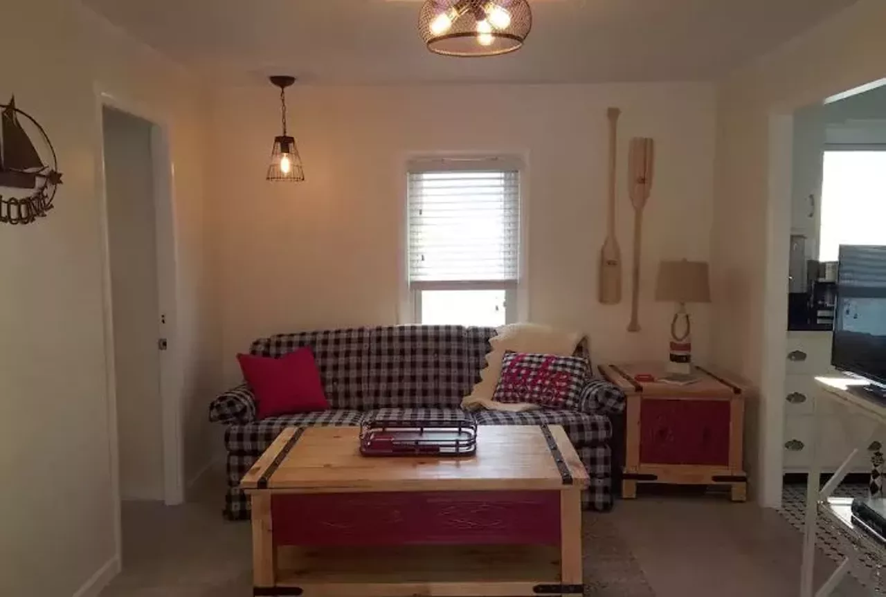 Saugatuck, Michigan&nbsp; Average nightly rate:$128 This cottage is literally adorable and would easily accommodate a family of four. Just imagine, enjoying a summer night full of s'mores in the firepit and enjoying board games on the front porch. It makes for a quick getaway complete with plenty of opportunities for family bonding.