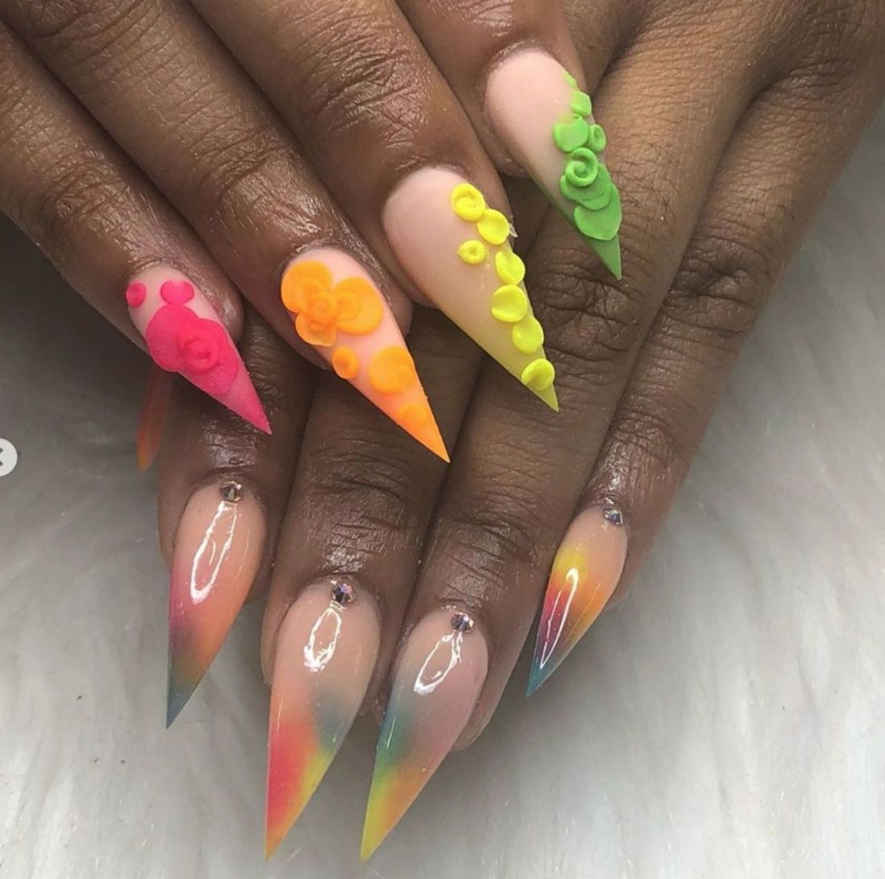 Kei Nail&#146;d It
@kei_nailedit
7233 E. Nine Mile Rd., Warren
Aside from Kei's detailed acrylics full of color and accessories, she also created Klaws Luxe Express Sets which are press-on nail sets people can buy and customize if they would like. Appointments can be booked through the link located in her Instagram bio.
Photo via  Kei Nail&#146;d It / Instagram 