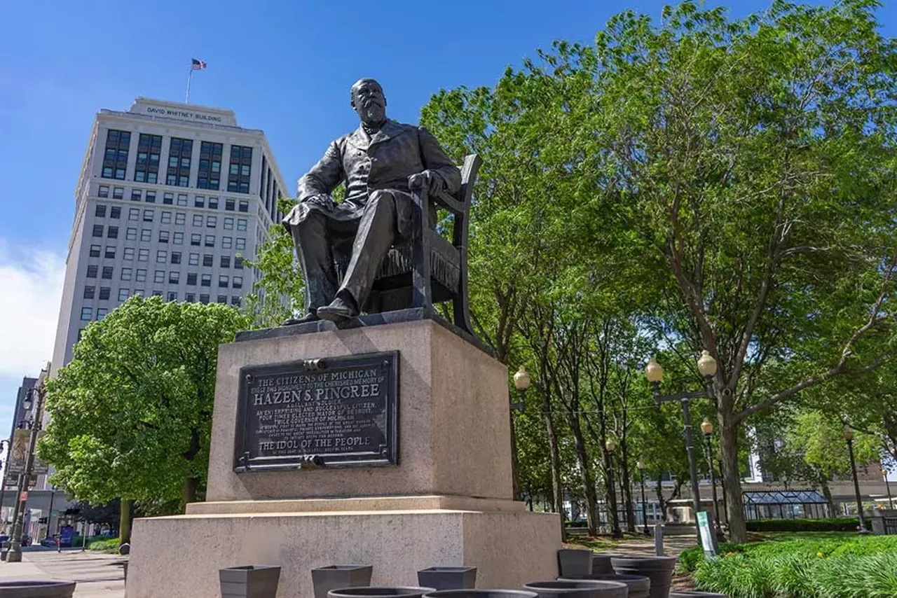 The statue of Hazen Pingree West of Woodward Avenue and south of Adams Street in Grand Circus Park, Detroit Chances are you’ve seen the statue of “Potato Patch Ping” downtown. He’s the businessman who was run for mayor in the 1890s, only to shock his big business backers by winning and promptly becoming a progressive reformer. He was among the first to encourage urban agriculture by allowing Detroiters to use vacant city-owned lots for potato patches during the Panic of 1893. He fought the railroad and electric trusts. He helped establish public transportation in Detroit. He was elected mayor four times and left office only to become governor. The plaque on the statue reads: “He was the first to warn the people of the great danger threatened by powerful private corporations, and the first to awake to the great inequalities in taxation and to initiate steps for reform, and calls him “The Idol of the People.”