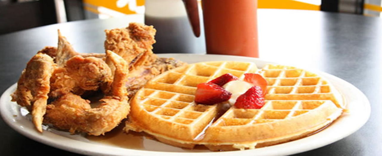New Center Eatery Courtesy photo Don't knock it til you try it: A Belgium waffle with some strawberry slices, butter and a few pieces fried chicken go together like peanut butter and jelly. Detroit's New Center Eatery is one of the more famous chicken and waffle destinations in town.