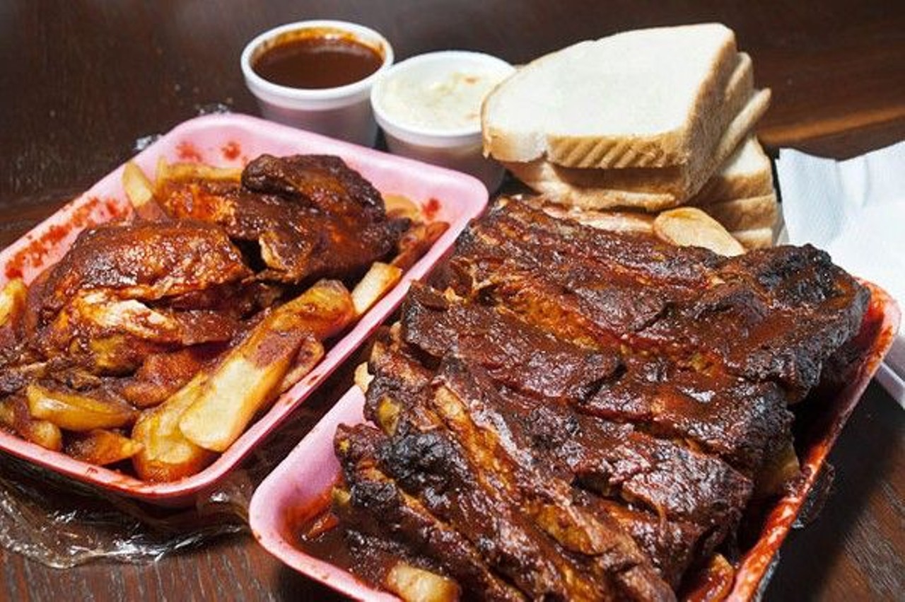 Vicki&#146;s BBQ
3845 W. Warren Ave., Detroit; 313-894-9906
Vicki's is one of Detroit's barbecue old-timers that's up at the top of the list in any conversation on our barbecue heavyweights. That partly owes to the St. Louis-style cut ribs that Vicki's cooks over an open pit (though you can also get them smoked). But the highlight in what's basically a highlight reel meal is the vinegar and tomato-based sauce. Though there's a heavy dose of acidic vinegar, this isn't Carolina-style, but perhaps a unique composition that mixes in the best of several barbecue worlds. Could you call it Detroit-style? Perhaps. Also worth noting is the packaging &#151; the ribs come tightly wrapped in cellophane and sit in a nest of fries soaking up the pool of excess sauce that you won't want to leave behind.
Photo via Tom Perkins