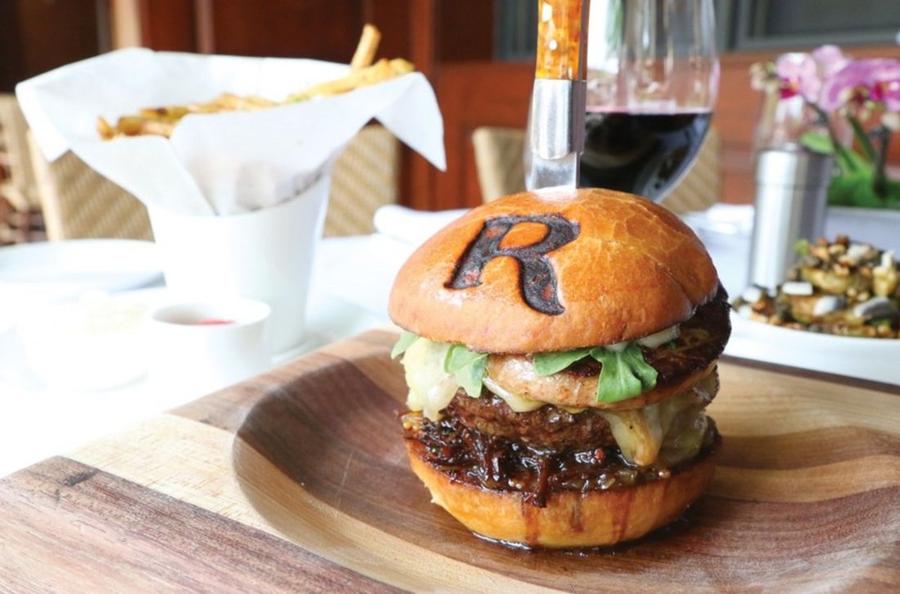 Rugby Grille
100 Townsend St, Birmingham
&nbsp;
The $55 Rugby Grille foie burger. Leave it to Birmingham to offer a burger at such a price. But here's why: It's stacked high with Wagyu beef, black truffles, a sweet onion jam, seared foie gras, arugula, parmesan aioli, braised short rib, and Thomasville tomme cheese, and paired with summer truffle fries. And how cute is that branded "R"? 
(Photo by Scott Spellman)