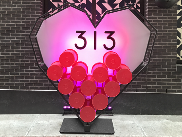 Melinda Anderson of Studio M Detroit partnered with Bedrock Detroit and Prop Art Studio to place a 313 Day installation in Parker’s Alley. The heart-shaped structure with "313" in the middle is the perfect spot to take 313 Day selfies.