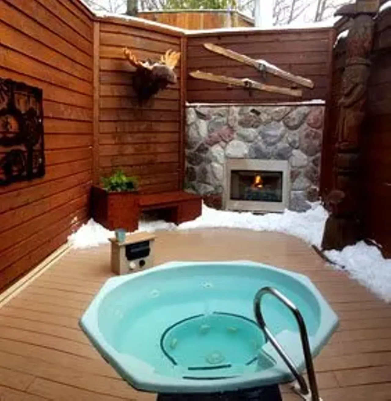 Oasis Hot Tub Gardens - 2301 S. State, Ann Arbor 734-663-9001 - Slip out of the cold and into the luxurious comfort of 102 degree water in a private hot tub room at Oasis Hot Tub Gardens where visitors can choose to soak in indoor or outdoor tubs decorated in themes ranging from tropical islands to rustic lodges.