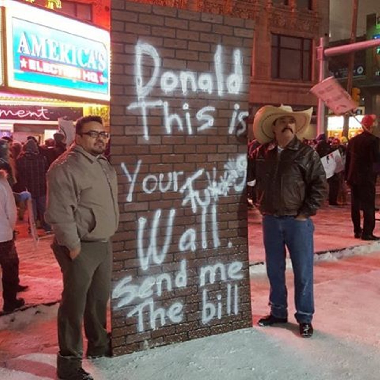 Protesters carry a wall with a message to the candidates, mocking Trump&#146;s promise to build a wall along the Mexican border. Photo via Instagram user @Live______Free