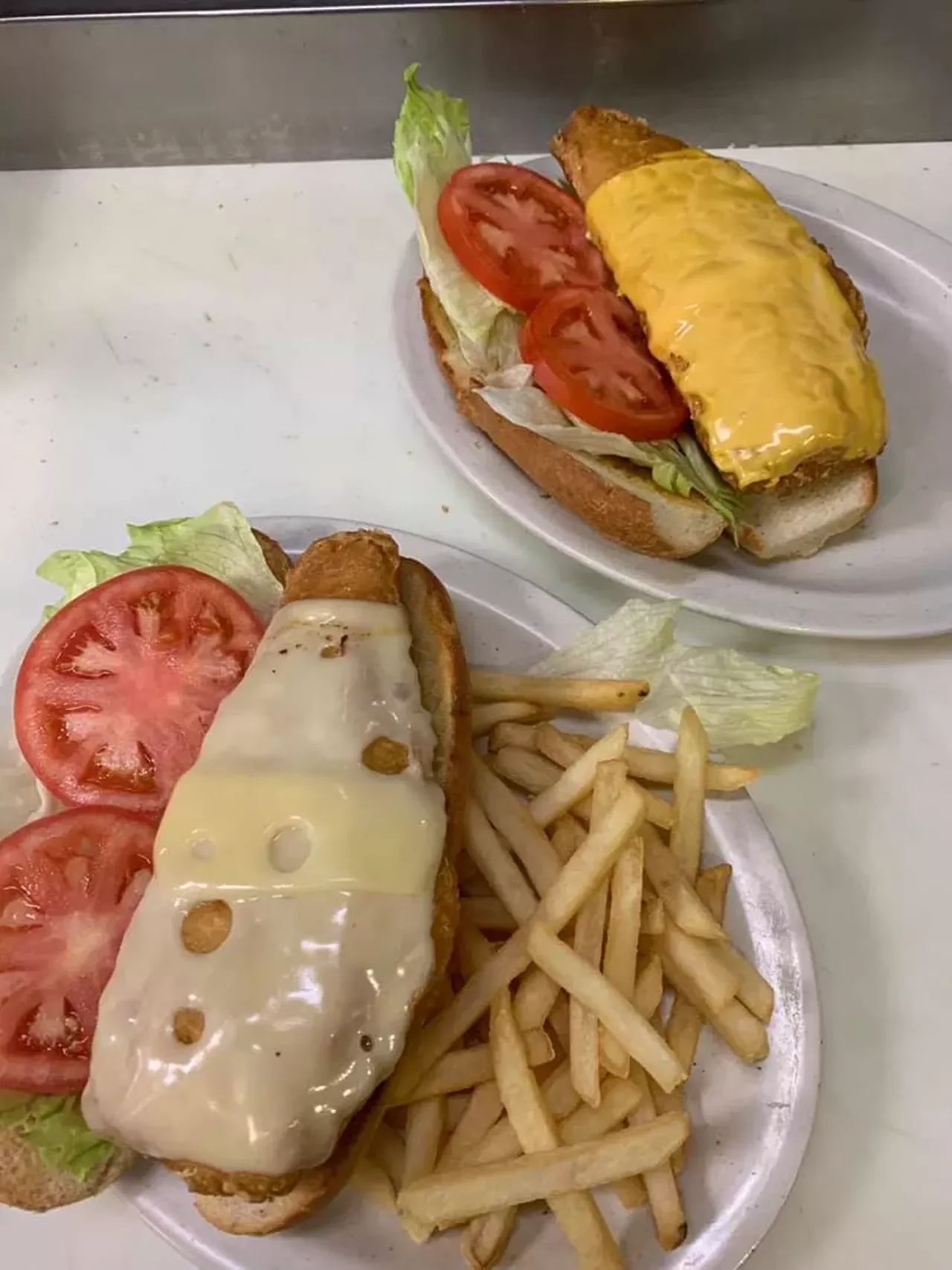 Sandy&#146;s by the Beech 25853 Five Mile Rd., Redford; 313-534-0333 Aeep-fried cod fillet is served on a sesame bun, and deep-fried tender clams come with fries, coleslaw, and grilled Texas toast. Photo via Sandy's by the Beech / Facebook 