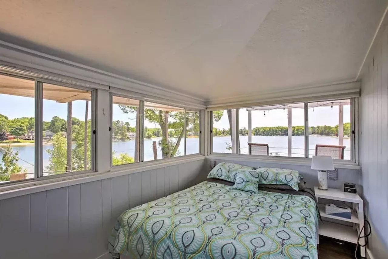 Cozy Traverse City House with Private Beach6 guests, 2 bedrooms, 4 beds, 2 baths $293 per night Two words: private beach. At this cozy and rustic Traverse City property, you can listen to the sounds of the beach waves without budging from the porch. This 1,000-sq. ft. home features a wood-burning fire pit, fishing dock, hammock, a boat ramp for all you beautiful boaters. You can experience some much needed rest and relaxation on the shore of Silver Lake. Want to get wet? There are paddle boats, kayaks, and rowboats available for use. Photos via Airbnb.com