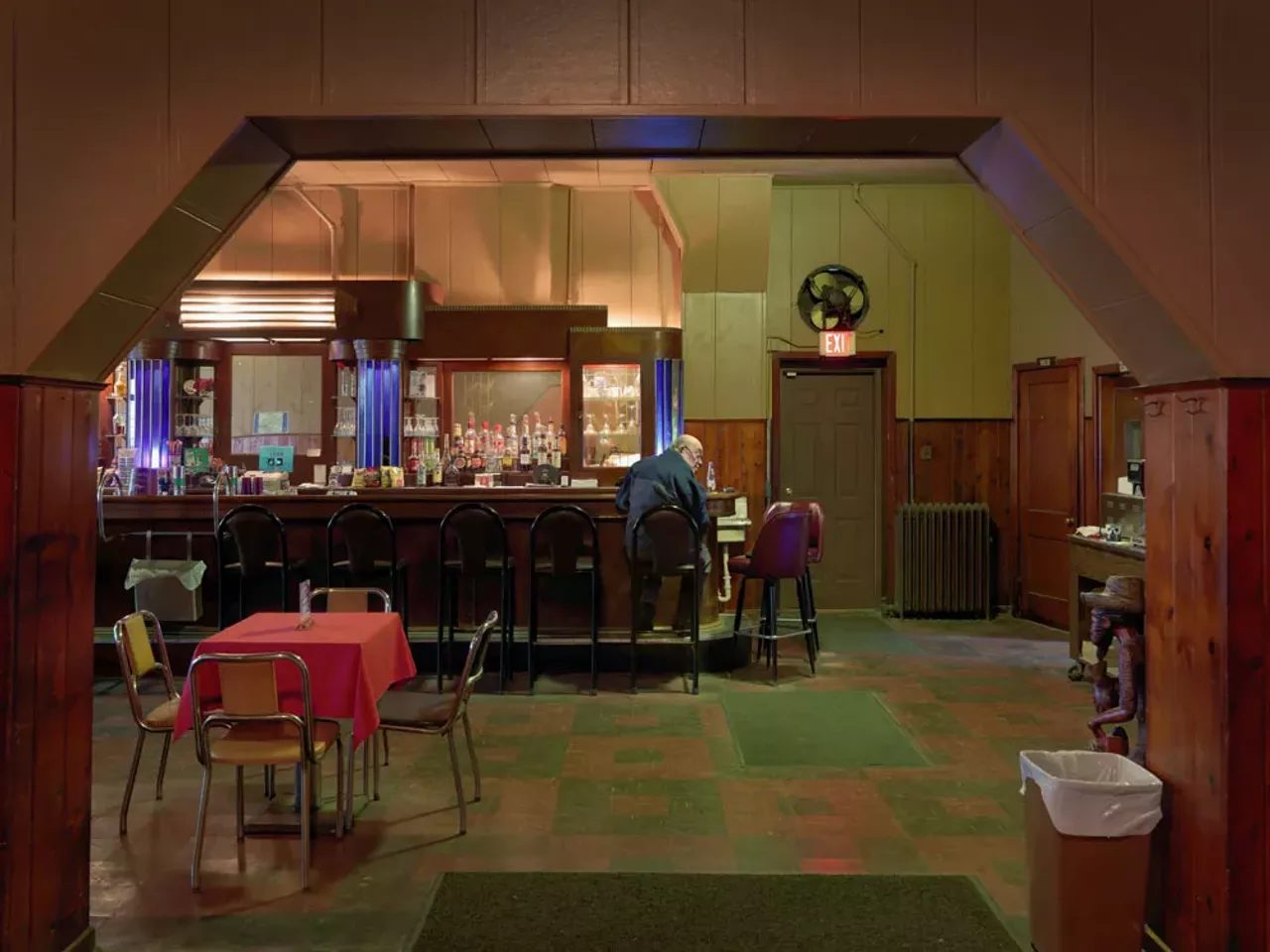 "Man Sitting at the Bar Kovac's Tavern, West Jefferson Ave Delray, Detroit," Dave Jordano, 2010, pigment print. Detroit Institute of Arts