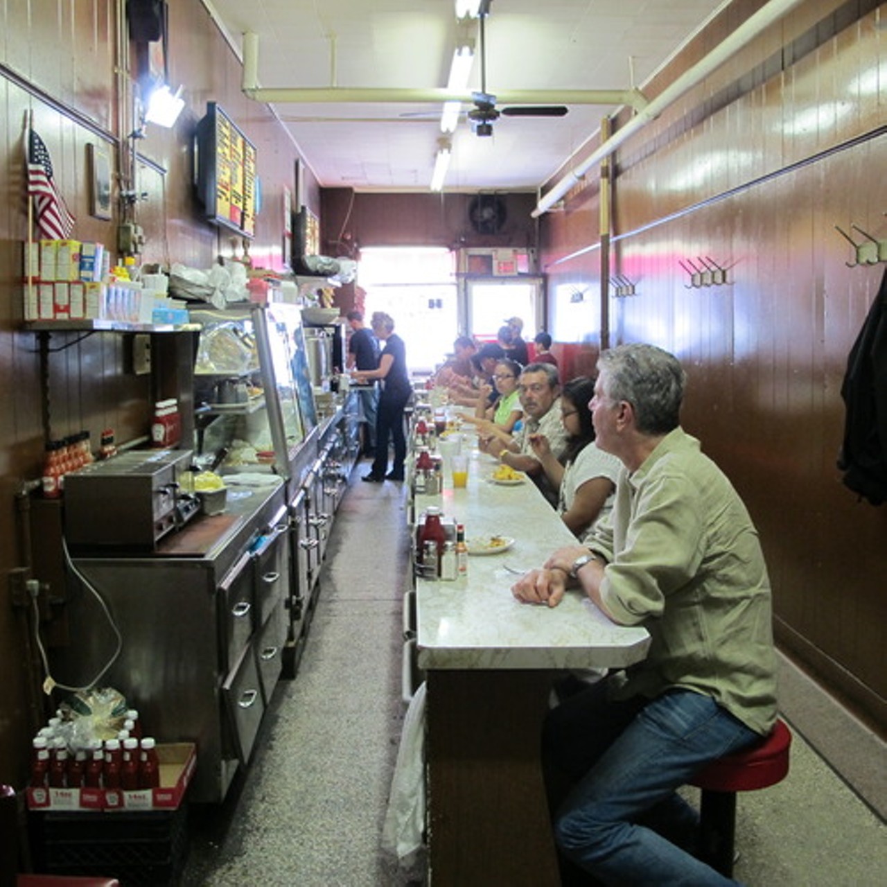  Anthony Bourdain ate his favorite Coney dog at Duly&#146;s  
Bourdain had the first coney he ever enjoyed at Duly's Place Coney Island in Southwest while filming an episode of &#147;Parts Unknown.&#148; After his experience at the 97-year-old diner, he called the "delicate interplay" between the ingredients of the hot dog, chili, bun, and raw onions "symphonic.&#148; 
Photo via  Tumblr