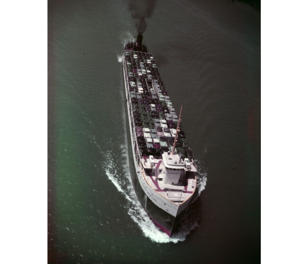 A freighter holding a ton of cars in 1961.