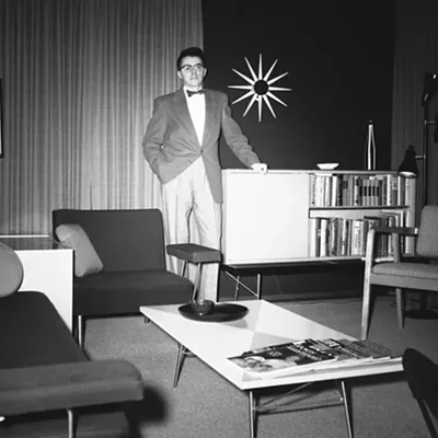 Self portrait - "This shot was really about the living room. I'd assembled quite a room, with all Herman Miller furniture and modern accessories. I was very proud of it as its owner and the designer of the room, but to take a photo of it, there needed to be a subject. I was never interested in self-portraits. You got to admit, that's a room."