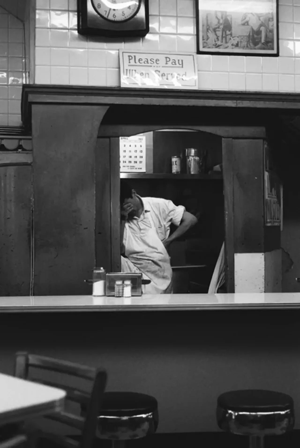 Short order cook, head in hand, Detroit, 1963 - "There's a true sense of exhaustion captured in this shot. We know that feeling. But then, maybe it's more, maybe what he's feeling is more grave than that. Despondence? We don't know, we can only wonder. Maybe he's just tired."