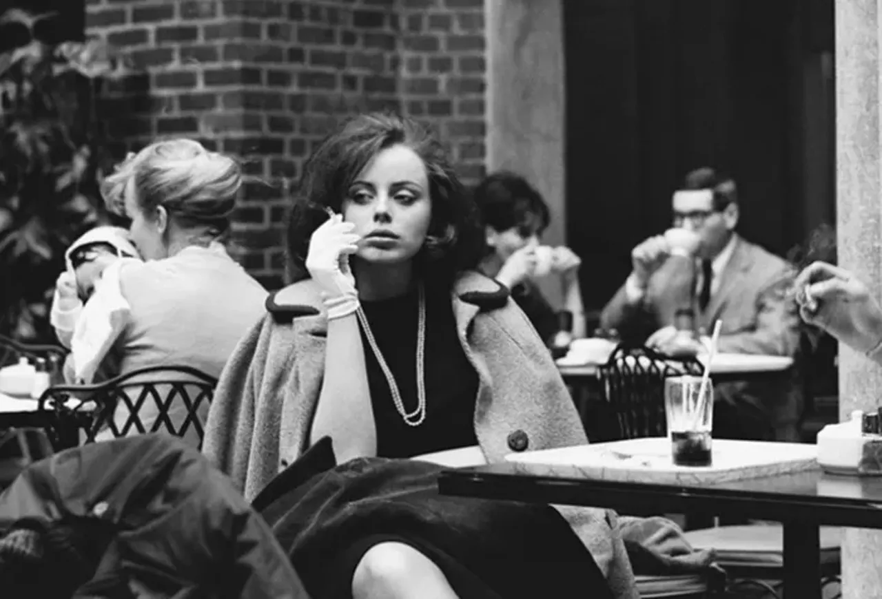 Woman smoking - "Often, in the afternoon, I'd grab a cup of coffee at the Kresge Court inside the Detroit Institute of Arts. There were always beautiful women there talking and smoking. Sometimes they looked like movie stars."