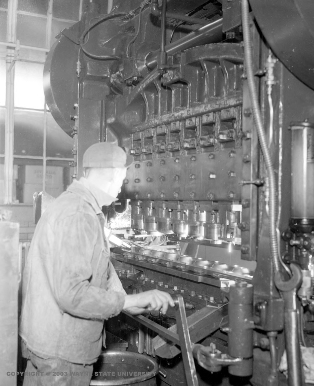 making auto lamps at the Flat Rock plant 
from Virtual Motor City (Photo credit: Detroit News Collection, Walter P. Reuther Library, Wayne State University)