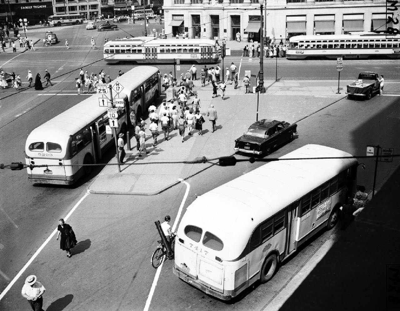 After the war, the push was on again to complete the system-wide conversion. Even though the city had bought a new fleet of PCC streetcars (seen in background), the DSR seemed determined to exploit every opportunity to make a rail line into a bus line. In 1951, three lines were switched abruptly to buses during a DSR strike. More closings followed until August 1955, when Mayor Albert Cobo, who promoted freeway construction as the way of the future, urged City Council to sell the city's recently purchased fleet of modern streetcars to Mexico City.