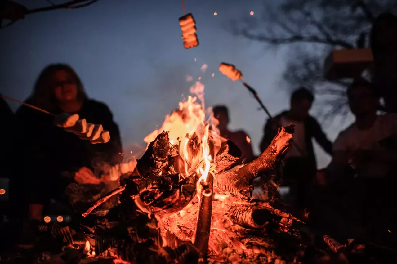 Have a bonfire If you’ve got a backyard, set up a bonfire pit, get some firewood, and crack open some Oberons with friends around the flames. Plus, you can do this all summer long, and well into the autumn and beyond, too.