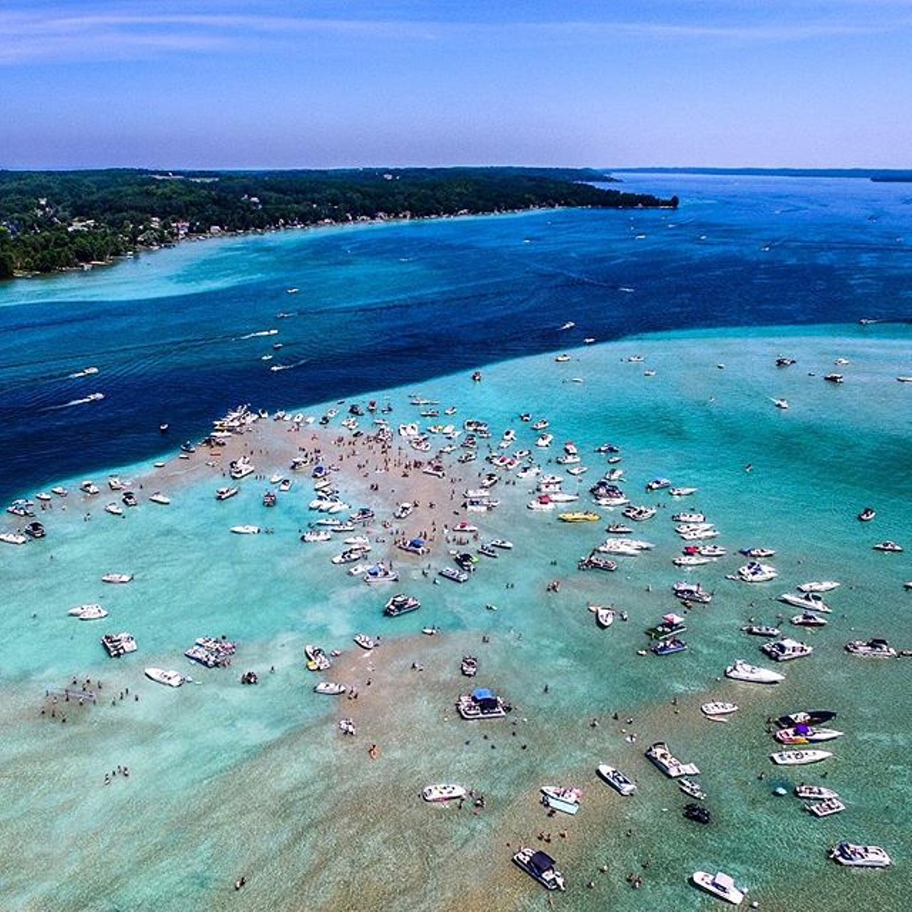 Torch Lake Michigan, Antrim County
Torch Lake stretches longer than any other inland body of water in Michigan with a continuous flow of water for 19 miles. Known for its clear water with a splash of turquoise it&#146;s perfect for every aquatic adventure you had in mind.(Photo via Instagram, @detroitinvaderz)