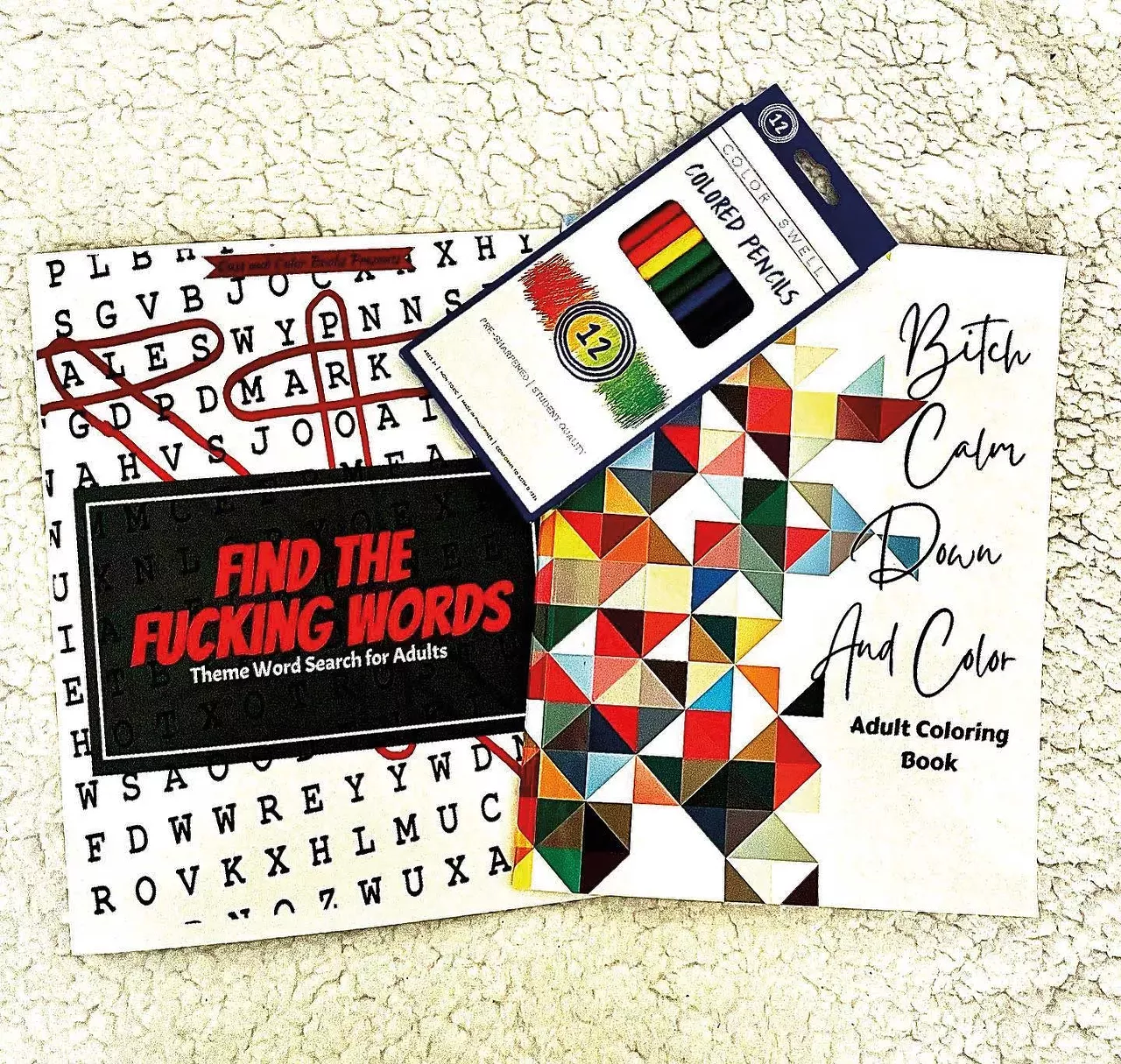 Cuss and Color Books allthingsmarketplace.com Adults like coloring too, damnit. Matter of fact, we should probably be coloring more than kids as a mental health break and to help us ground when the world around us is going to shit. These adult coloring books from Cuss and Color Books help take the edge off. They have coloring books called “Bitch Calm Down and Color,” word search books titled “Find the Fucking Words,” and canvas prints with slogans like “You Hoes be Trippin” and “Zero Fucks Given.” —Randiah Camille Green