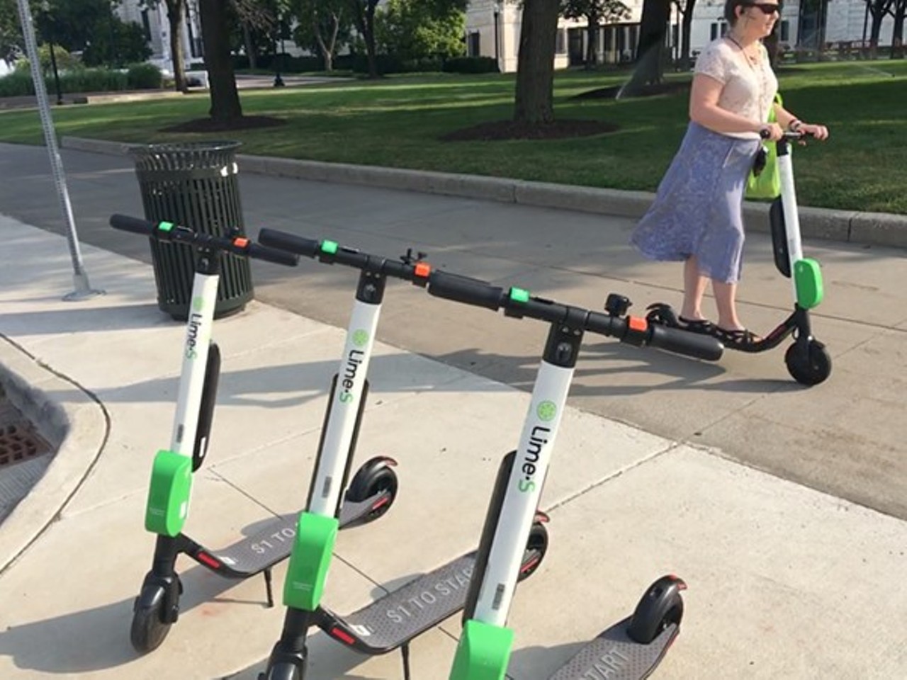 Everyone being irrationally mad at scooters (and lowkey riding them) 
When e-scooters first appeared on Detroit&#146;s landscape in the summer of 2018, people lost their dang minds. While some view them as a convenient way to zip around town, others curse their very existence and relish every time one is found disabled, discarded, or destroyed on the side of the road. We miss the near collisions and tired complaints just as much as we miss trying to fit two people on one scooter, because life before corona was about having no rules. We miss that. 
Photo by Lee DeVito
