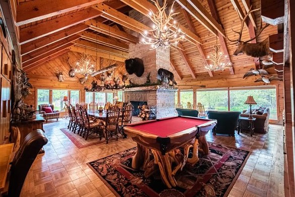 The Royal Stag Lodge (Grayling)
    16+ guests, 6 bedrooms, 3.5 baths
    $1,043 per night&nbsp;
    Dating to the 1940s, this one-of-a-kind spot has exposed beams, custom metal railings, mounted animal heads, and authentic pelts.&nbsp;
    Photo via Airbnb