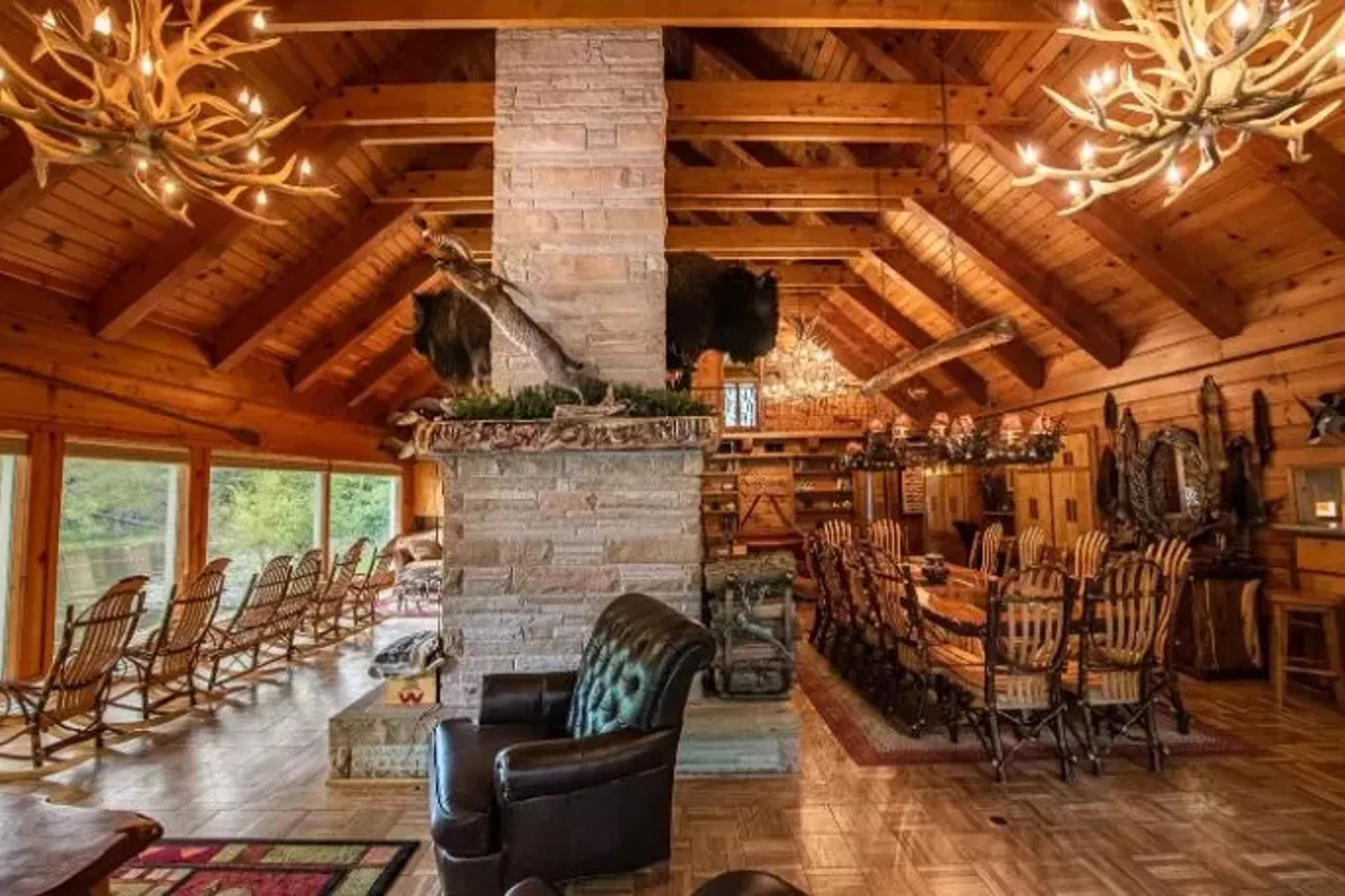 The Royal Stag Lodge (Grayling) 16+ guests, 6 bedrooms, 3.5 baths $1,043 per night&nbsp; Dating to the 1940s, this one-of-a-kind spot has exposed beams, custom metal railings, mounted animal heads, and authentic pelts.&nbsp; Photo via Airbnb