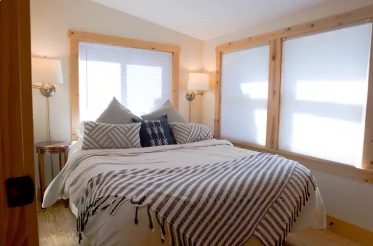 Pear Tree Cottage (Spring Lake) 4 guests, 2 bedrooms, 2 bath $131 per night This cozy cabin in beautiful Spring Lake manages to feel luxurious despite its 1000-square-foot layout.&nbsp; Photo via Airbnb