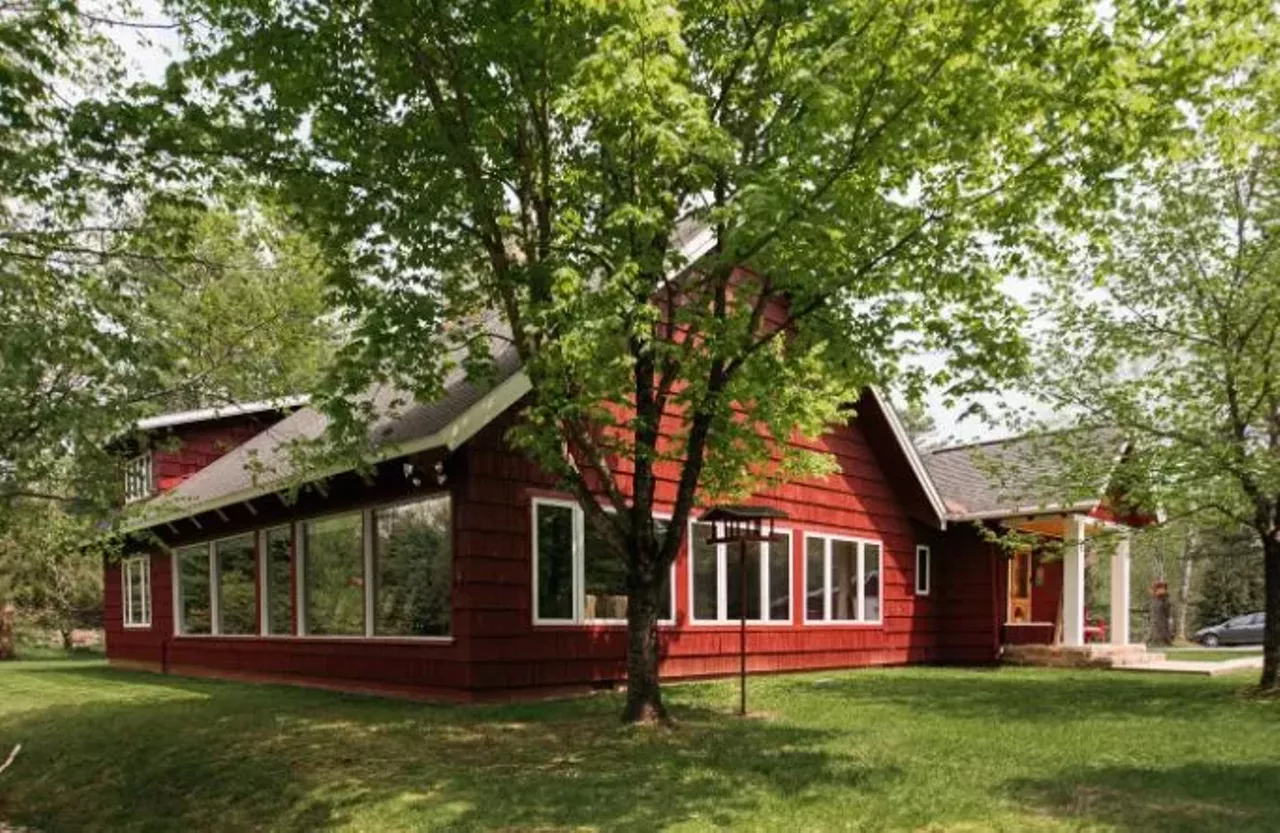 The Royal Stag Lodge (Grayling) 16+ guests, 6 bedrooms, 3.5 baths $1,043 per night&nbsp; Dating to the 1940s, this one-of-a-kind spot has exposed beams, custom metal railings, mounted animal heads, and authentic pelts.&nbsp; Photo via Airbnb
