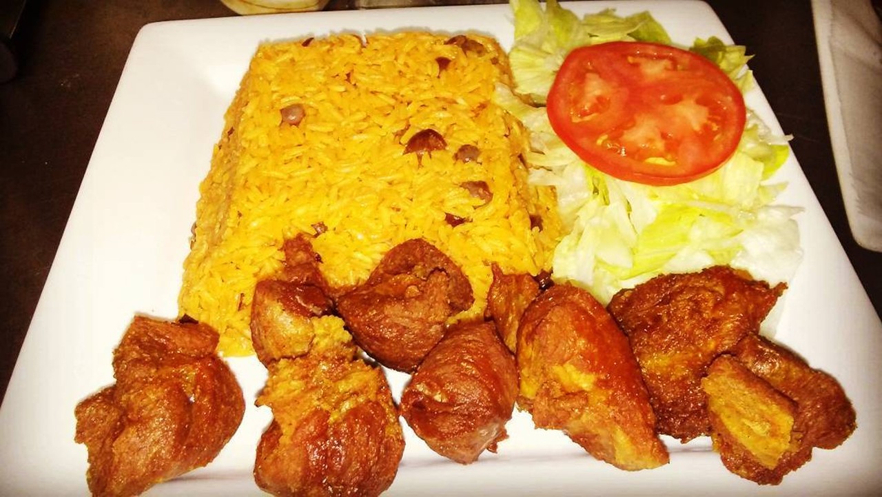Rincon Tropical 
Detroit | 6538 Michigan Ave | (313) 334-8526 
Rincon Tropical delivers rich Puerto Rican food, with a stand out dish of Arroz con Granules & Pernil. Essential it is a dish of rice, pigeon peas, and pork on the side. Devilishly delectable. (Photo: rincontropicaldetroit, via Instagram)