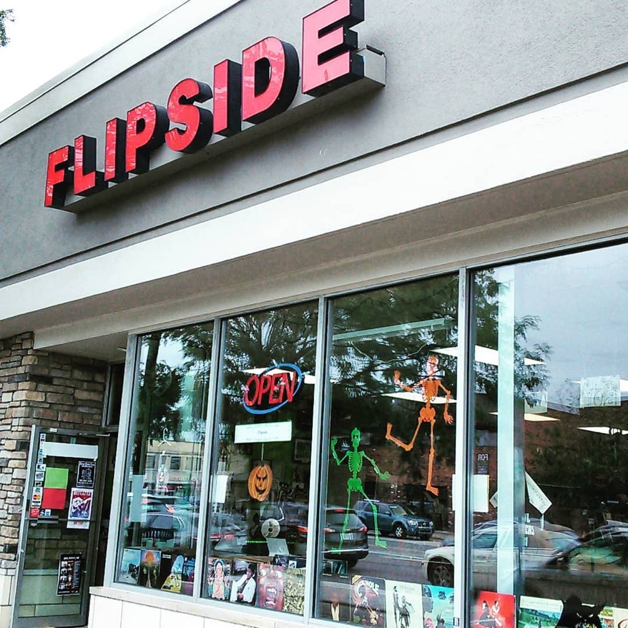 Flipside Records
41 E. 14 Mile Rd., Clawson; 248-585-4090; shopflipsiderecords
After it started selling records independently in 1980, Flipside Records got the storefront treatment and quickly expanded to offer T-shirts and other collectibles. Due to downtown development, the store plans to soon relocate to Berkeley, so help them out by taking advantage of their moving sale before their last day in Clawson on Dec. 26, 2021.
Photo via Flipside Records/Facebook